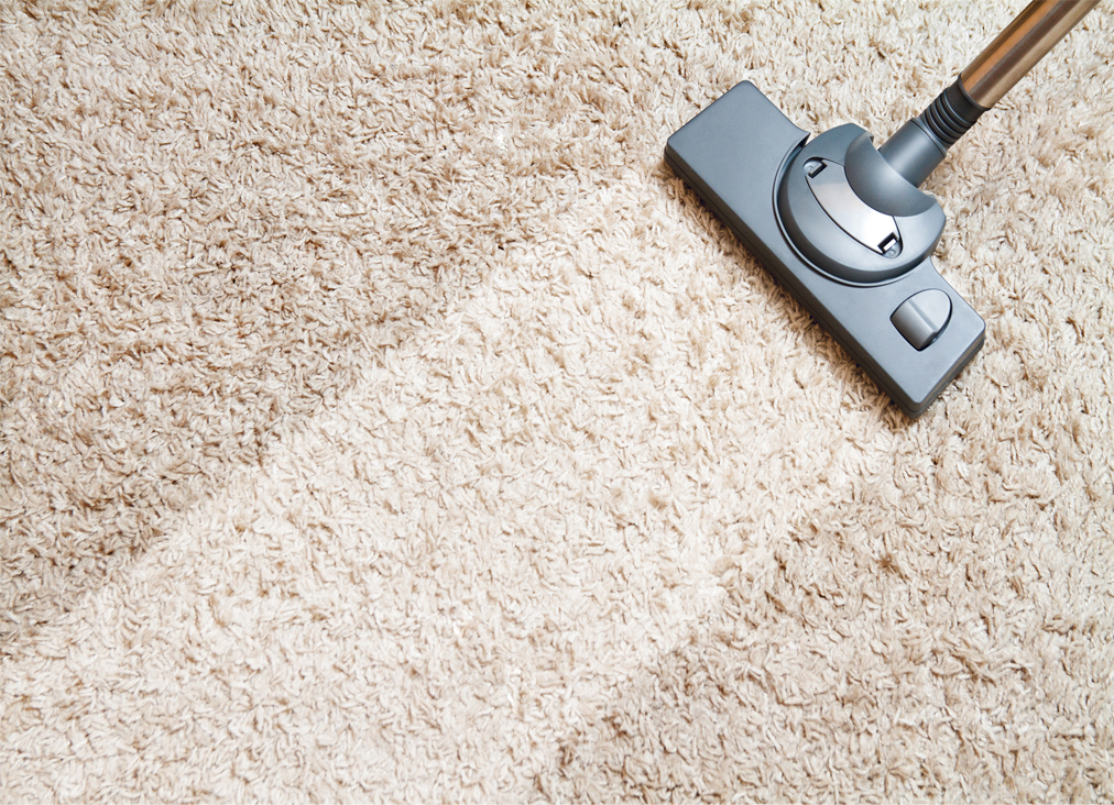 Vacuuming a carpet