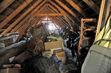 A cluttered, dirty attic